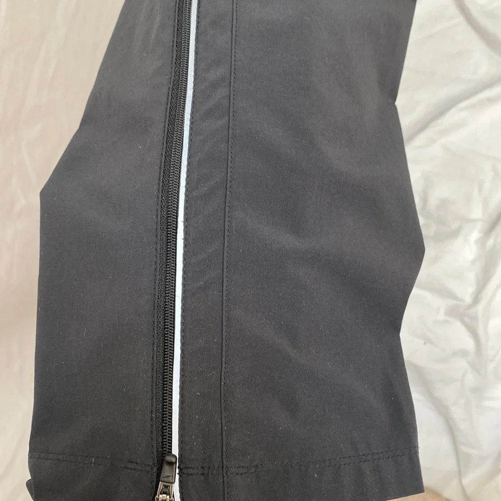 Nike Men’s Dri-Fit black running joggers. Size small.